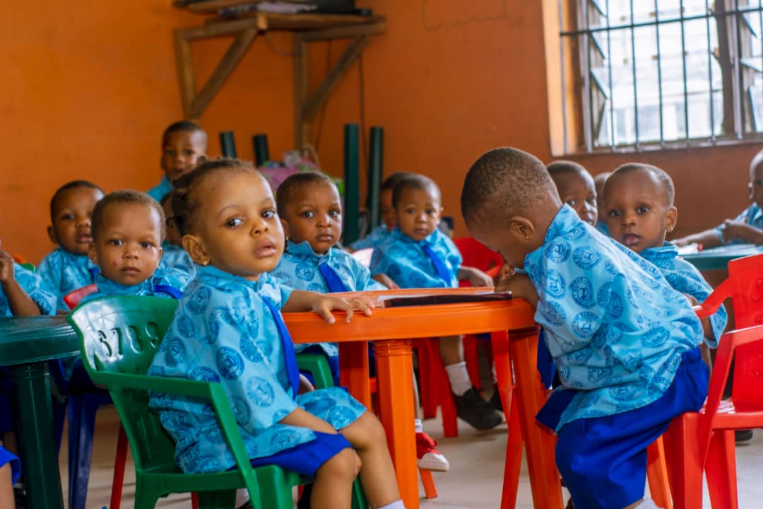 Students learning in a modern classroom layout